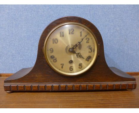 An oak mantel clock