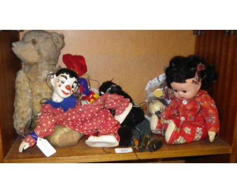 A composition headed clown puppet, other similar items and a mohair Teddy Bear