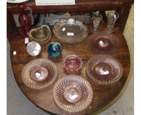 A cranberry glass vase and a collection of decorative glassware