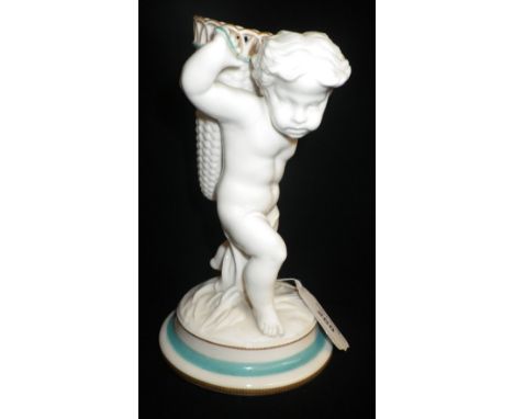 A Copeland ceramic figure of a child carrying a basket