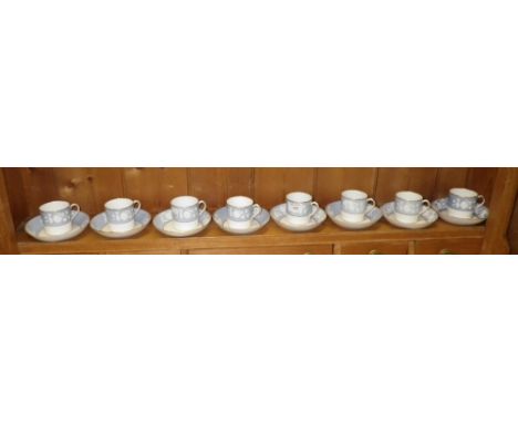 A set of eight 19th century blue and white coffee cans with saucers