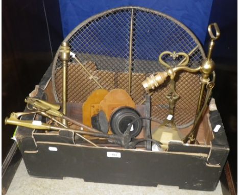 A Victorian brass framed fire guard, a quantity of fire tools, table lamps and similar items