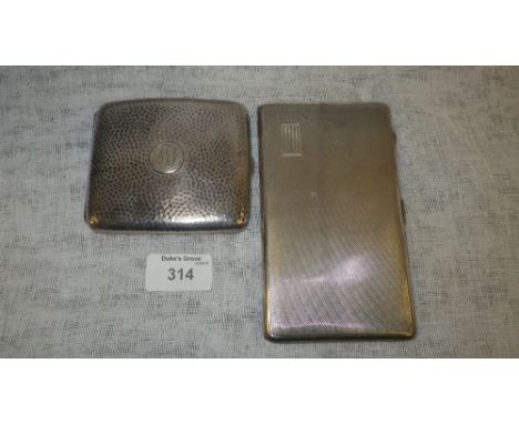An engine-turned silver cigarette case belonging to Dr Denis Wright, The BBC's First Military/Brass Band Advisor and a planis
