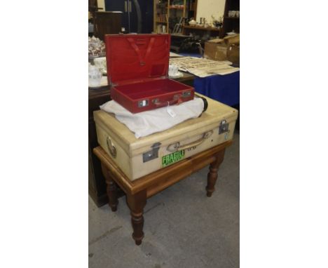 A vintage red leather writing case, a vellum case and a black leather Trussardi briefcase