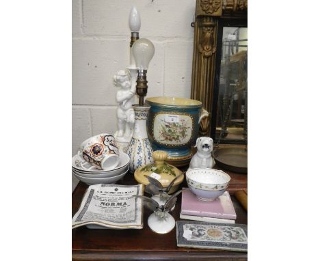 A pair of Rosenthal ceramic butterflies, a cherub table lamp and similar ceramics