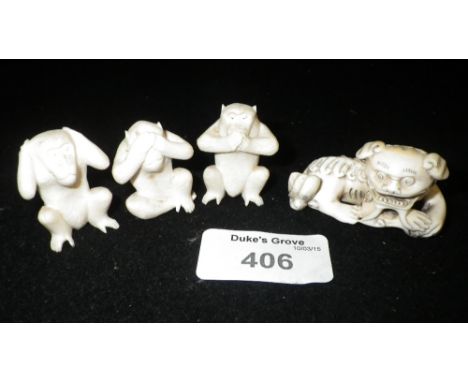 A Netsuke type carving and three wise monkeys