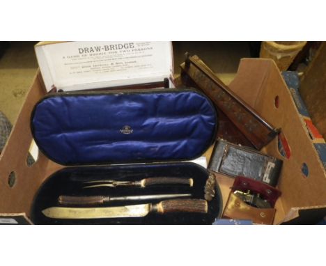 A quantity of assorted items including a carving set, camera and others