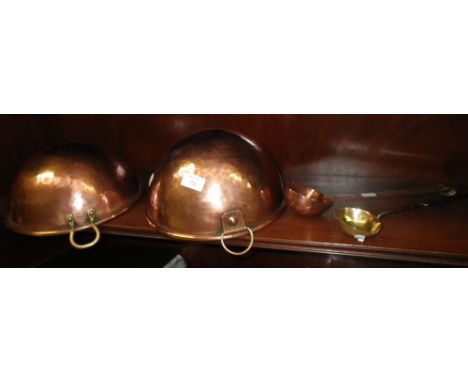 A 19th century brass ladle with iron handle, another similar and two copper egg whisking dishes
