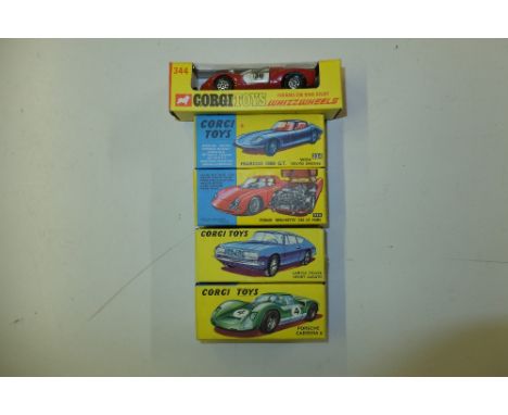 A Corgi Toys Marcos 1800 GT with Volvo engine ; together with a Porsche Carrera 6 330; a Lancia Fulvia Sport Zagato 332; a Fe