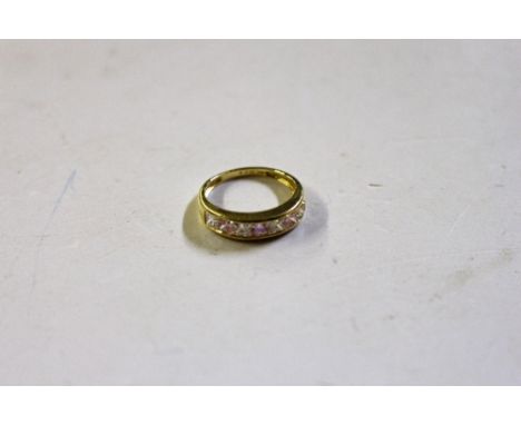 A 14ct gold half eternity ring