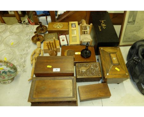A Victorian rosewood tea caddy; together with various wooden boxes; a pair of olive wood travelling candlesticks; a lay doll 