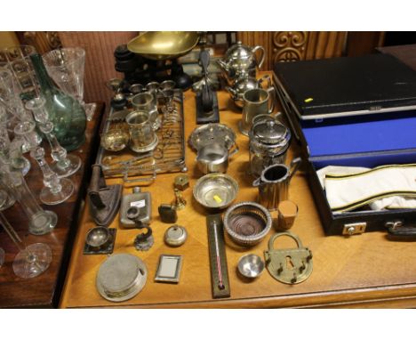 A quantity of silver plated and other metalware, to include teapot, a hip flask, coasters, a set of kitchen scales etc. 