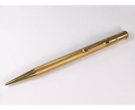 GOLD PENCIL. A 9ct. gold, Yard-O-Led propelling pencil in engine turned case.