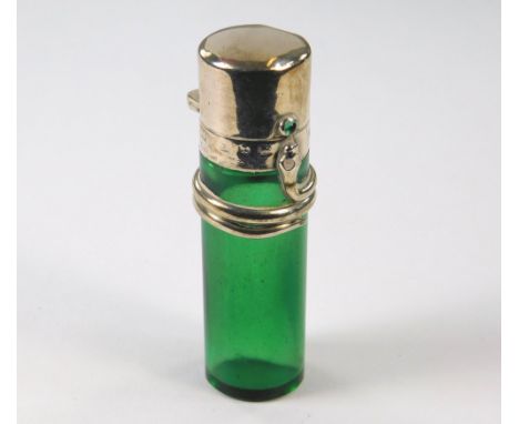 SMELLING SALTS BOTTLE.A Victorian silver mounted, green glass smelling salts bottle with serpent decoration & glass button th