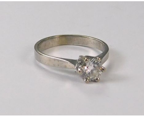 DIAMOND SOLITAIRE. A 14ct. white gold diamond solitaire ring in coronet setting, the stone of approximately 1ct. spread. Size