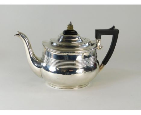 SILVER TEAPOT. A late Victorian silver teapot. London 1896. Approx. 18oz.