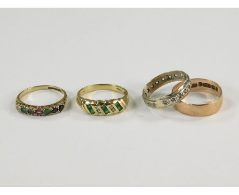 GOLD RINGS. Two 9ct. gold gem set dress rings, a 9ct. rose gold wedding band &amp; a 9ct. gold &amp; silver eternity ring.