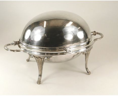 BREAKFAST DISH. An EPNS revolving breakfast dish, with ceramic liner. Width 35cm.