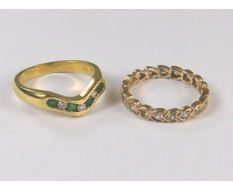 GOLD RINGS. An 18ct. gold emerald &amp; diamond ring &amp; a 9ct. gold full hoop eternity ring.