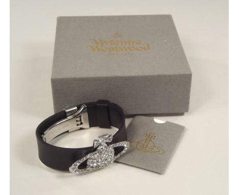 VIVIENNE WESTWOOD.A Vivienne Westwood cuff bracelet with diamante orb front, unworn & with original leaflet & box.