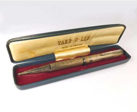 SILVER PENCIL. A Yard-O-Led engine turned silver propelling pencil, in fitted case. London 1975.