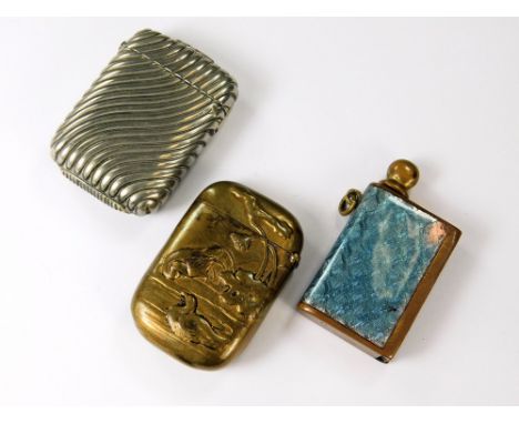 VESTA CASES ETC. Two vesta cases in brass &amp; silver plate. Also, an enamelled match striker case with suspension ring.