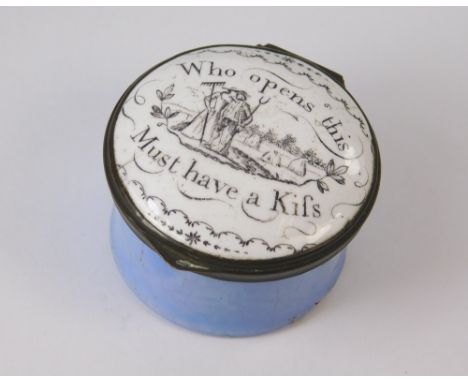 PATCH BOX.A late 18th/early 19th century circular enamelled patch box, the lid with a couple in a rural scene and the homily 