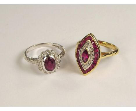 DRESS RINGS. An 18ct. gold ruby &amp; diamond dress ring, size L &amp; an unmarked marquise dress ring, set with synthetic st