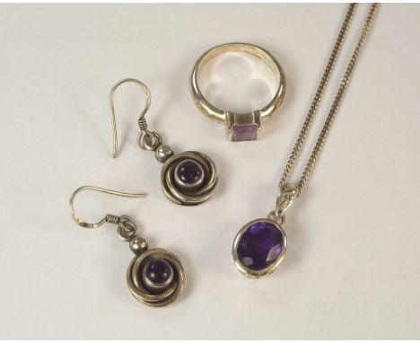 AMETHYST JEWELLERY. A silver &amp; amethyst pendant, similarly set earrings &amp; a similar dress ring.