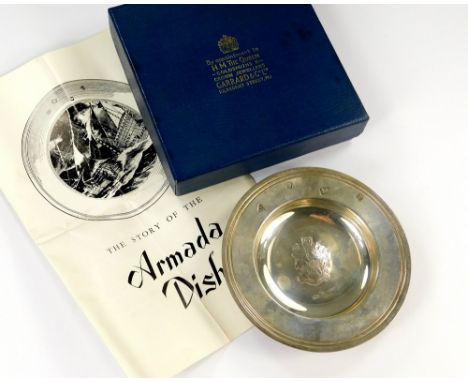ARMADA DISH. A small silver 'Armada' dish, by William Comyns &amp; Sons for Garrard &amp; Co., Ltd. Diameter 9.5cm. Original 