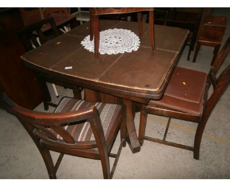 oak extending dining table and 4 chairs