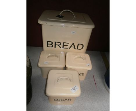 4 painted enamel storage tins