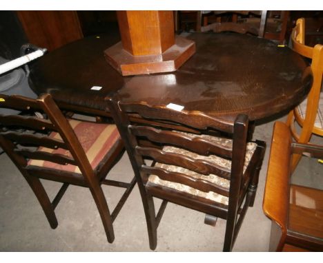 oak extending dining table and 4 chairs