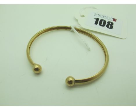 A 9ct Gold Child's Torque Bangle, (2.5grams). 