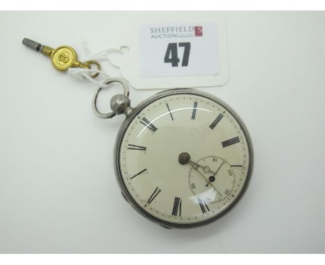 A Hallmarked Silver Cased Openface Pocketwatch, the dial with black Roman numerals and seconds subsidiary dial, within engine