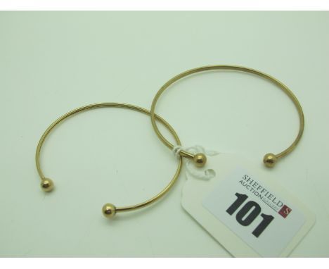 A Dainty Torque Style Bangle, stamped "375"; together with another bangle similar. (2) 