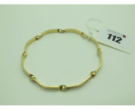 A Solid 9ct Gold Bangle, of twisted design (11.5grams).  