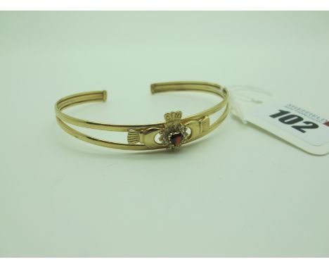 A Modern 9ct Gold Claddagh Style Bangle, with claw set cluster to the centre (4.5grams). 