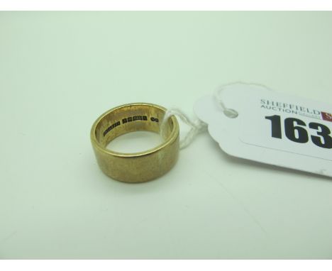 A 9ct Gold Wide plain Wedding Band, (approximate finger size M) (6.5grams). 