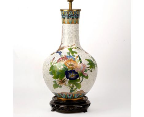 A MODERN ORIENTAL CLOISONNE BALUSTER TABLE LAMP decorated with bats, exotic birds and chrysanthemums, all on a pierced wooden