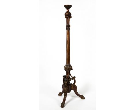 A LATE 19TH / EARLY 20TH CENTURY CARVED MAHOGANY TORCHERE with gilded and painted decoration, a hexagonal stem, four cabriole