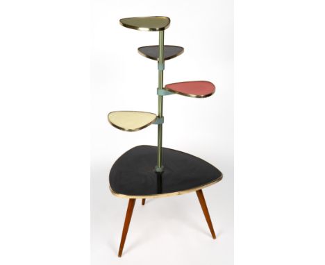 A MID TO LATE 20TH CENTURY RETRO PLANT STAND with central post on a triangular base and with three turned tapering legs, labe