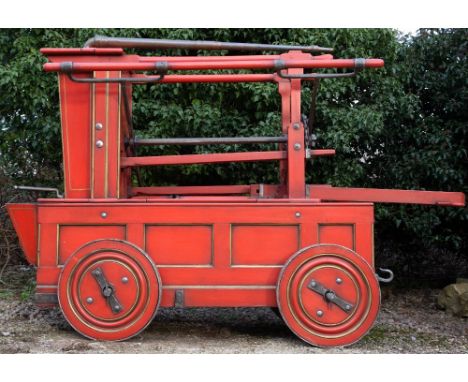 AN 18TH CENTURY AND LATER MANUAL FIRE PUMP possibly by Bristow of London, approximately 198cm long x 160cm high overall In 17