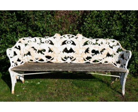 A VICTORIAN COALBROOKDALE FERN PATTERN GARDEN BENCH with wooden slatted seat, 192cm wide x 55cm deep x 90cm high Condition: r