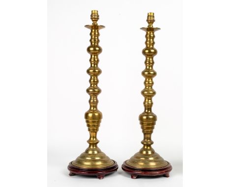 A PAIR OF BRASS LAMPS of bobbin turned form, each 58cm in height Condition: untested, need rewiring, brass in good condition
