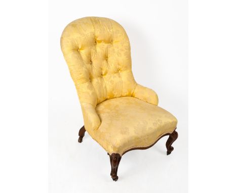 A VICTORIAN SILK AND BUTTON UPHOLSTERED SMALL SIZED NURSING CHAIR with cabriole legs and brass and ceramic casters, 50cm wide