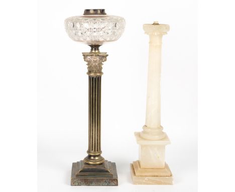 A 19TH CENTURY SILVER PLATED OIL LAMP of Corinthian column form by Evered &amp; Co Limited and having a cut glass well and st