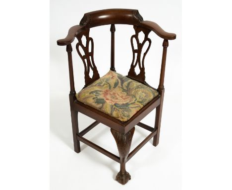 AN 18TH CENTURY STYLE MAHOGANY CHILD'S CORNER CHAIR stamped 'H Samuel 484 Oxford Street, London' to the base, 45cm wide x 33c