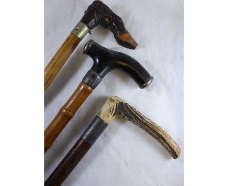 ANTLER HANDLE RIDING CROP, ANIMAL HOOF HANDLED WALKING STICK AND ONE OTHER WITH SILVER MOUNTS TO HANDLE