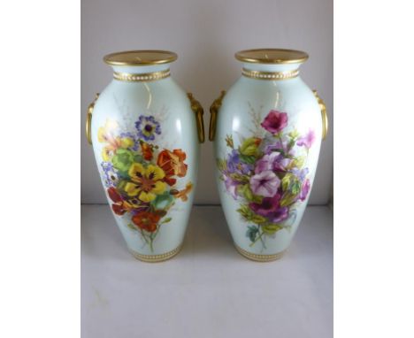 PR. ROYAL WORCESTER RING HANDLE TURQUOISE GROUND VASES WITH FLORAL PANEL DECORATION AND BEADED BORDERS, MOULDED MARKS, APPROX